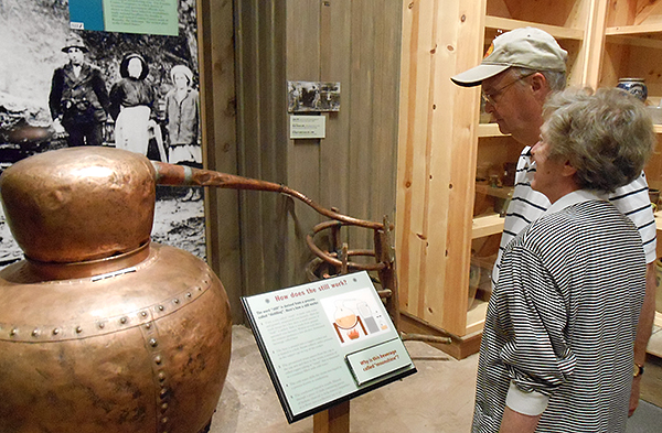 Visitors take in the artifacts at the Virginia Historical Society. (Photos by Burl Rolett)