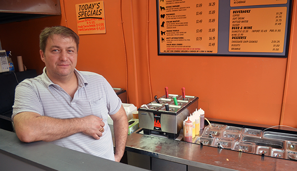 Oleg Vaytser manages Unleashed Gourmet Hot Dogs. (Photo by Mark Robinson)