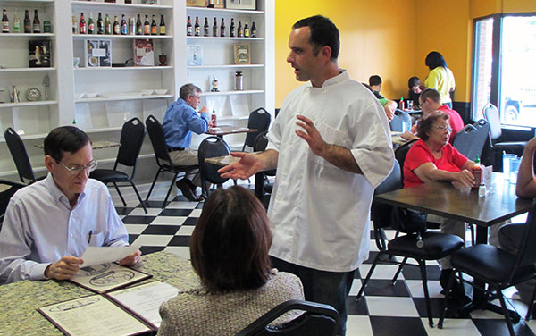 Owner and head chef Patrick Harris talks to diners at Boka Kantina. (Photos by Michael Thompson)