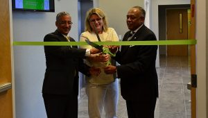 Health Diagnostics Laboratory CEO Tonya Mallory, Mayor Dwight Jones, and Rep. Bobby Scott mark the completion of Health Diagnostic Laboratory's $100 million headquarters. Courtesy of HDL.