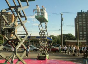 Steve Markel dumps paint on the site of the future VCU Institute for Contemporary Art. Photo by Brandy Brubaker.