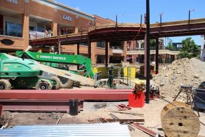 Crews work on construction of a new bridge at the outdoor mall. Photo by Michael Thompson.