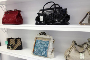 Alice McQueen's inventory includes high-end brands like Louis Vuitton. 