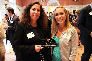 Jennifer Green and Krissy Sowers of Accounting Principals show off their Generosity Inc. award. Accounting Principals, Parker + Lynch and Ajilon Professional Staffing gave $5,000 in 2013 to the local Boys and Girls Club.