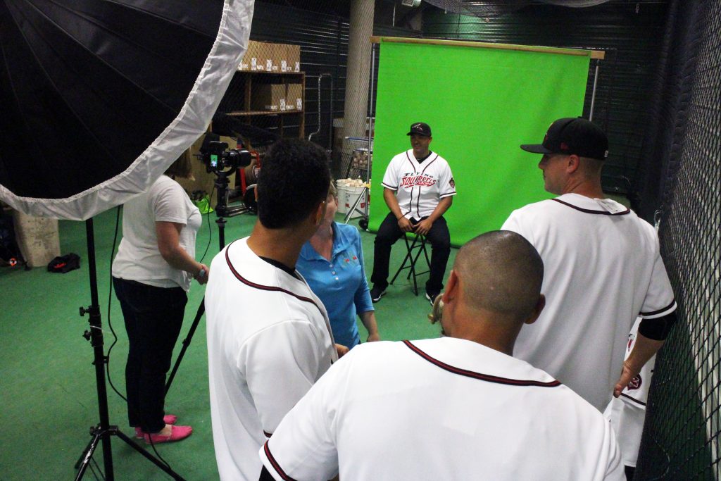 The Flying Squirrels snap photos for this year's roster at Tuesday's Media Day event. Photos by Jonathan Spiers.