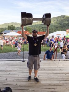 Brandon Tolbert hoisting the 2015 Virginia Craft Brewers Cup for The Answer Brewpub.