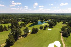 The home overlooks the James River Course's ninth hole. 