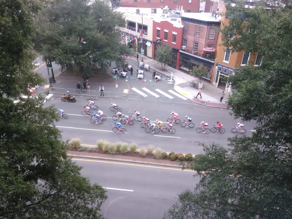 An overhead shot of cyclists zipping by the BizSense Global News Lair. (Photo by Jonathan Spiers)