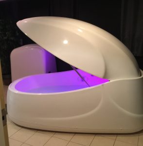 Flotation therapy pods are light-proof, sound-proof and filled with water and hundreds of pounds of Epsom salt. 