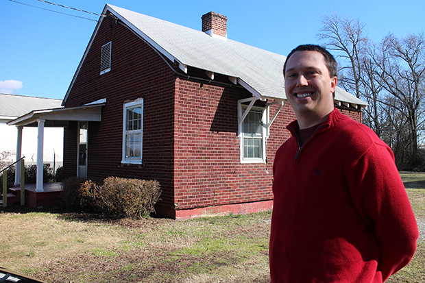 Kevin Randesi outside the house he's converting into an office for 804 Real Estate. Photo by Jonathan Spiers.