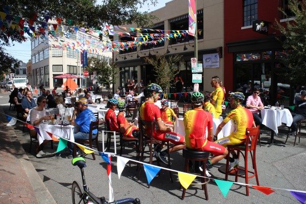 Riders in an extended sidewalk dining area during the Richmond 2015 event. (Mike Platania)