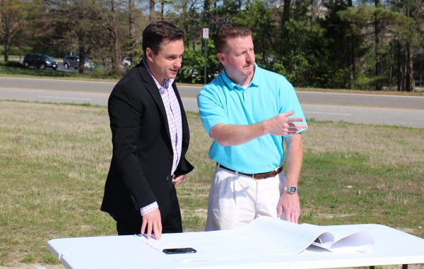 Matthew Mullet, left, and Wash Your Way RVA owner Max Koehler mull over development plans for a car wash in Innsbrook. (J. Elias O'Neal)
