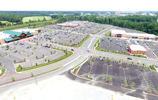 The 60-acre Cabela's and Wegmans-anchored West Broad Marketplace sold for $74 million.