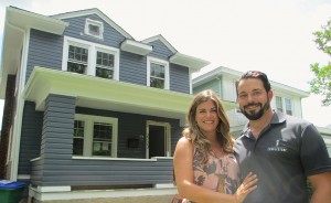 Breese and Josh Romano in front of a home they restored in Richmond's Northside. (Jonathan Spiers)
