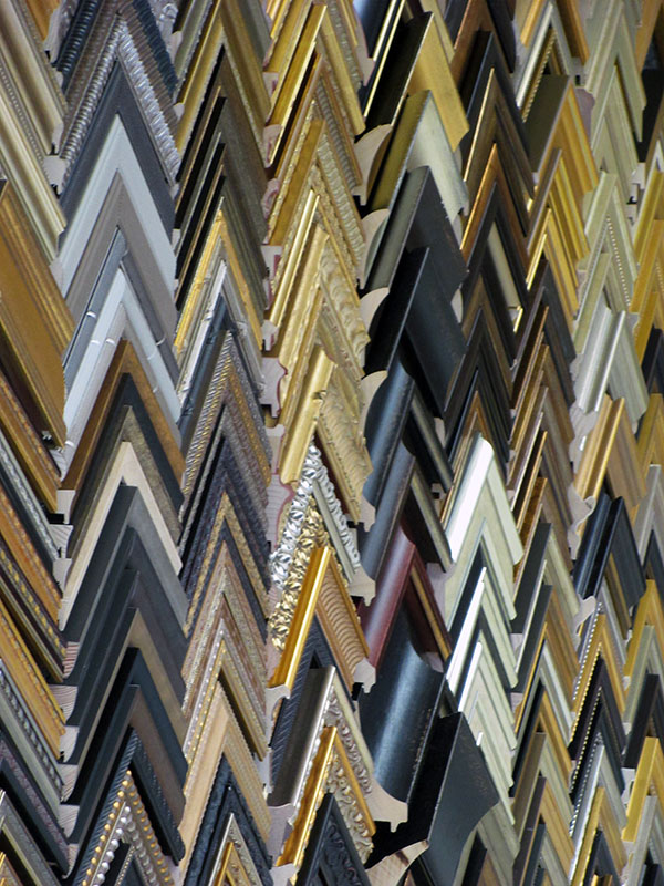 Options range from basic black molding to hand carved frames with 22-karat gold finishes.