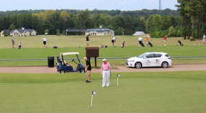 The putting green and driving range at Independence Golf Club.