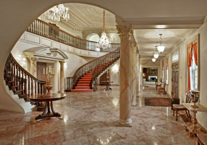 There are marble floors and molding and gold features throughout the home. 