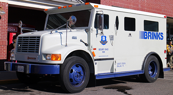 A Brink's armored truck parks outside the Lombardy Street Kroger. Photo by Burl Rolett.