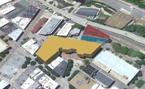 The plan as envisioned would build above Canal Street (blue) and on the adjacent land (red) to connect with Martin Agency's current building (yellow). 